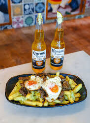 Traditional Chilean Chorrillana (Beef & Egg Loaded French Fries!)