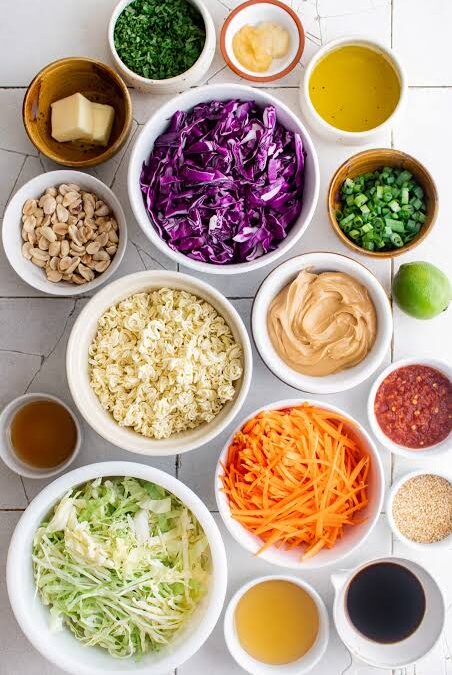 Crunchy Ramen Noodle Salad with Thai Red Curry Sauce + Sesame Caramelized Cashews